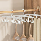 Variety of tank tops neatly displayed on the 12-hook rotatable hanger.