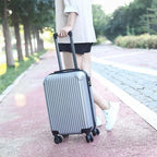 Close-up of the durable travel bags' textured surface and sturdy handles.