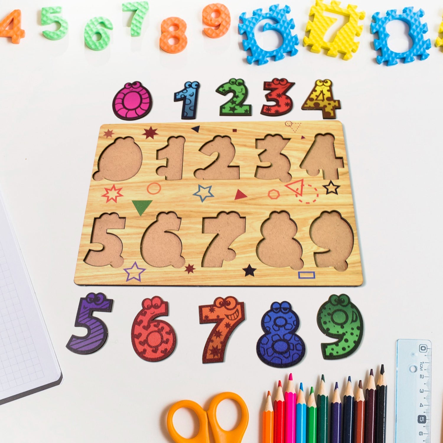 Toddler happily playing with a colorful wooden number puzzle board.