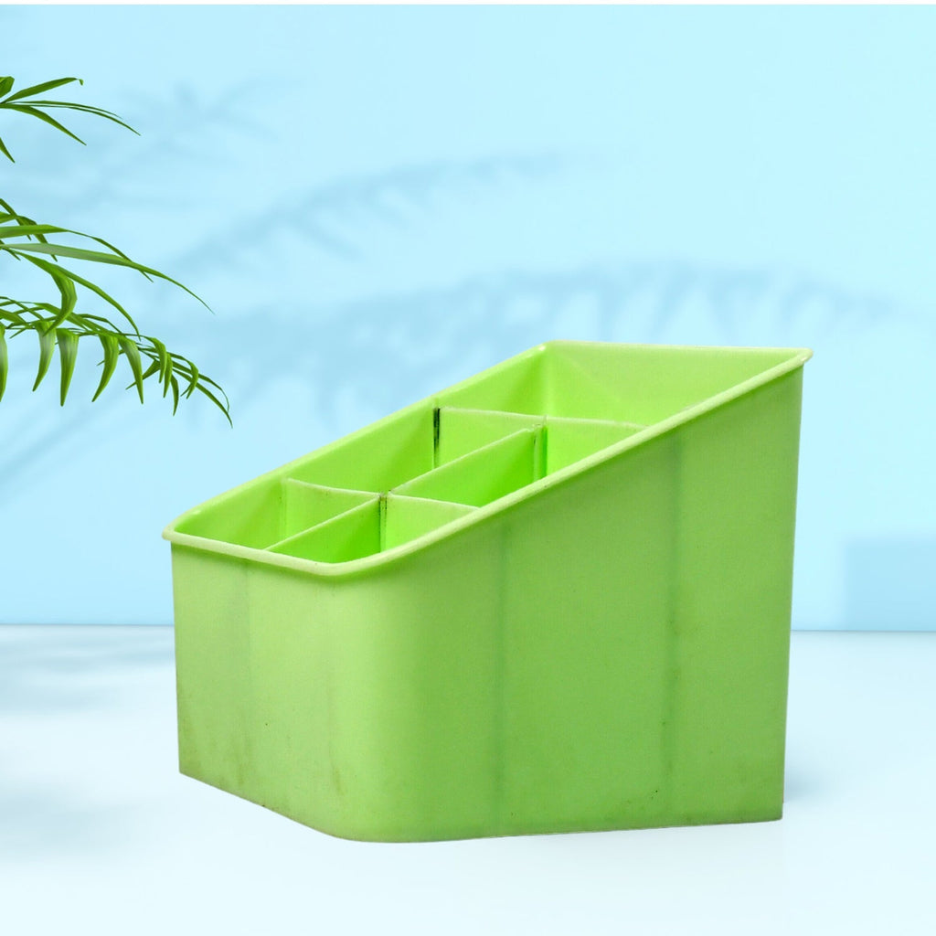 Multi-purpose clear plastic storage box on a wooden living room shelf.