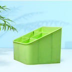 Multi-purpose clear plastic storage box on a wooden living room shelf.