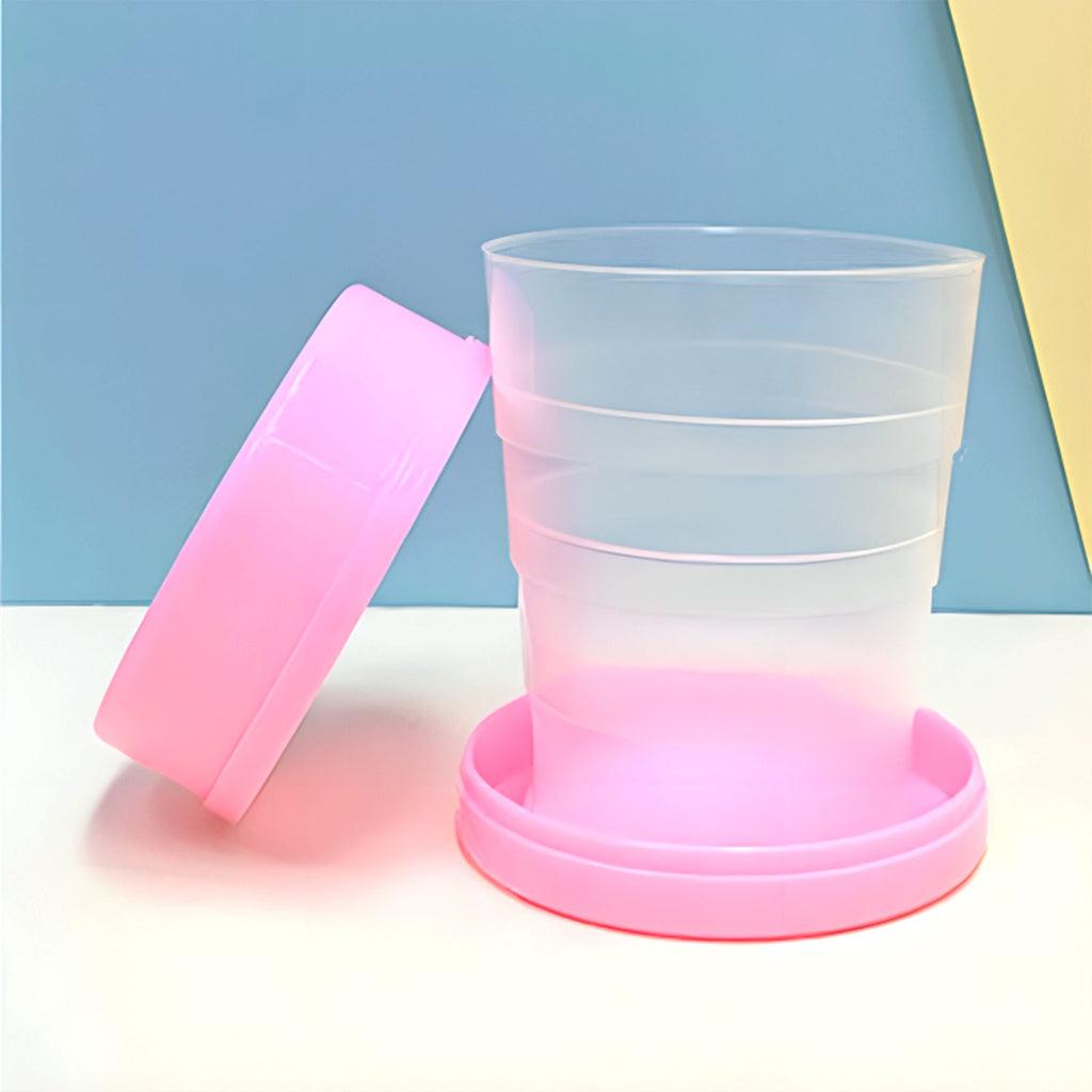 A close-up of the lightweight folding travel cup, highlighting its portable design.
