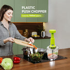 Side view of the manual vegetable chopper, showcasing its comfortable and ergonomic push handle.