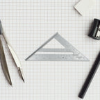 A carpenter using the versatile 45-degree triangle ruler for framing, ensuring accurate cuts.