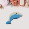 Dolfin Reusable Kitchen Sponge shown in use, effectively cleaning a kitchen surface.