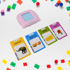 Child happily using the educational flash card learning device.