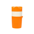 Manual orange juice maker with an angled spout for drip-free pouring.