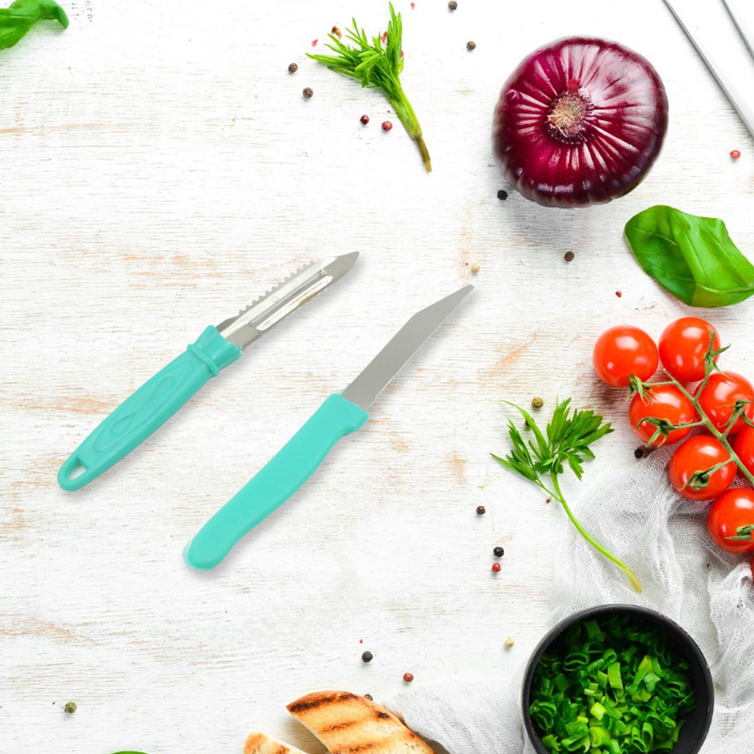 Quickslice kitchen tools: a sharp knife, efficient peeler, and durable gas lighter displayed.