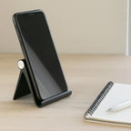 Foldable mobile phone stand folded flat for easy travel storage
