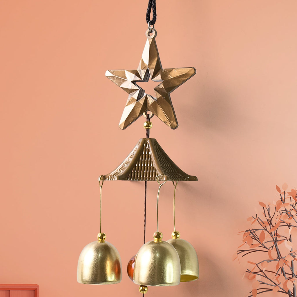 Dragonfly wind chime producing soft relaxing tones in a patio outdoor setting