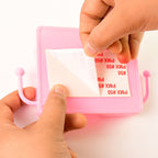 Adhesive wall mobile holder with hook to organize devices and accessories