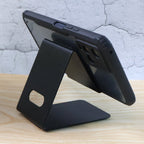 Universal mobile and tablet stand supporting a tablet for hands-free use