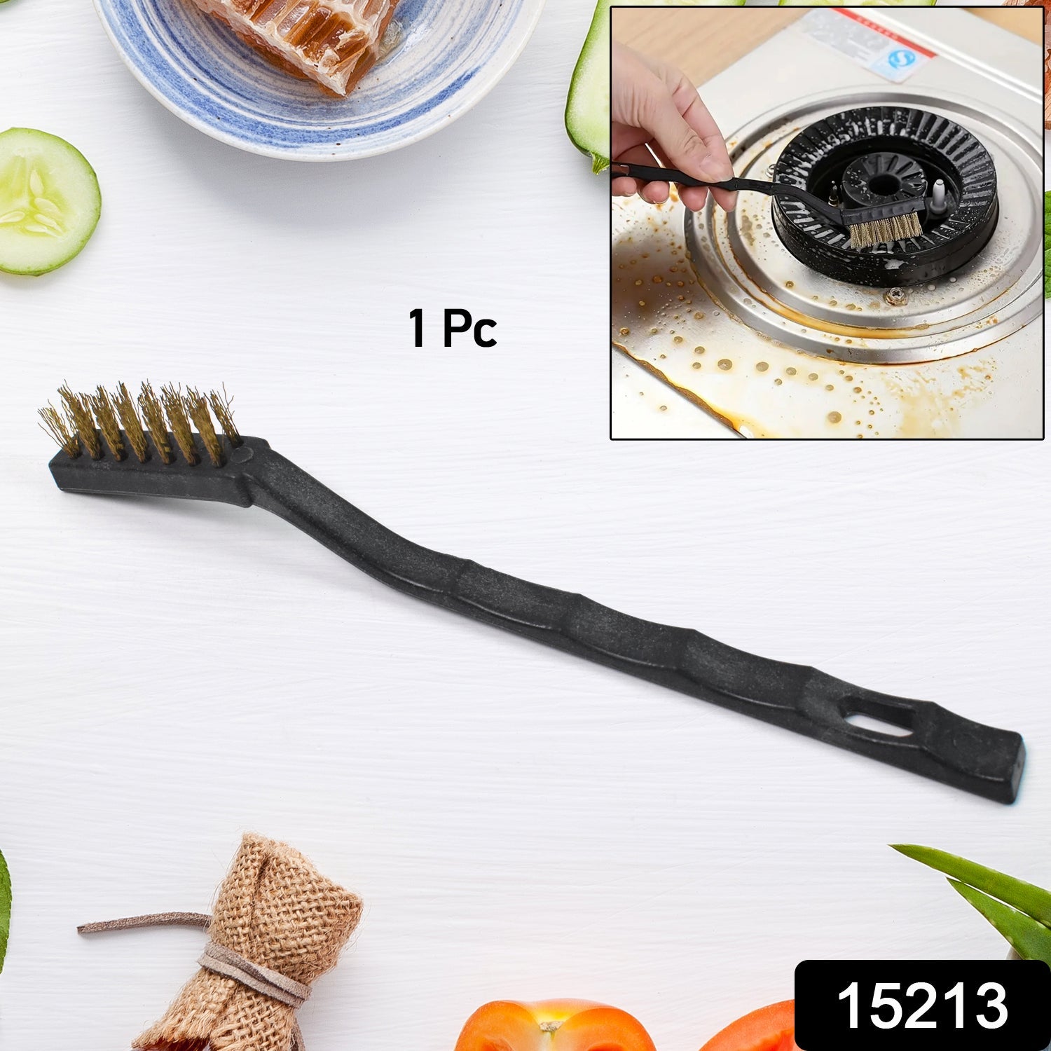 Ergonomic mini brass wire brush with an angled head for reaching tough spots.