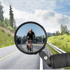RaceVault Bar End Bike Mirror installed on a bike handlebar, providing a wide rearview for enhanced cycling safety.