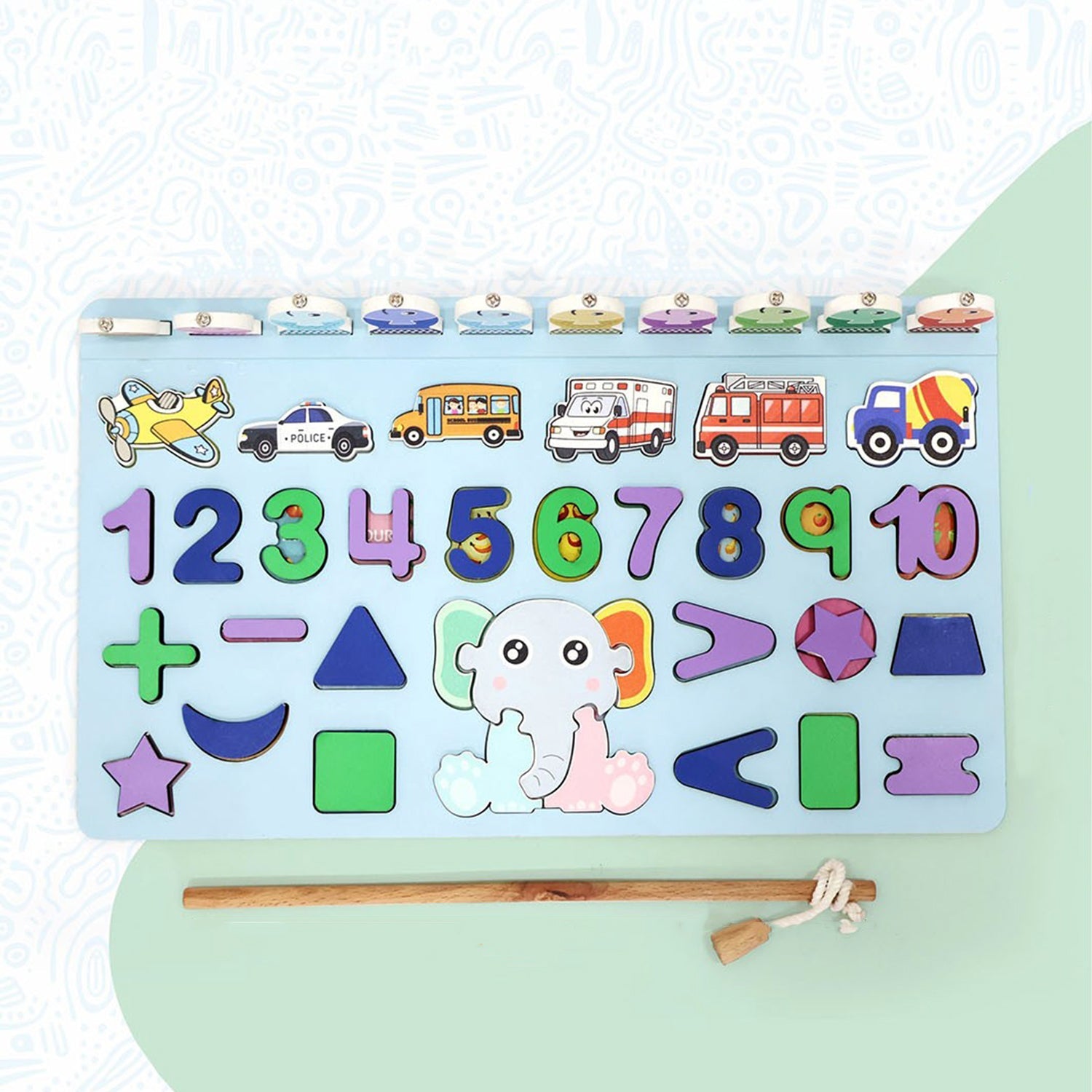 Detailed view of the magnetic rod and wooden number pieces of the puzzle.