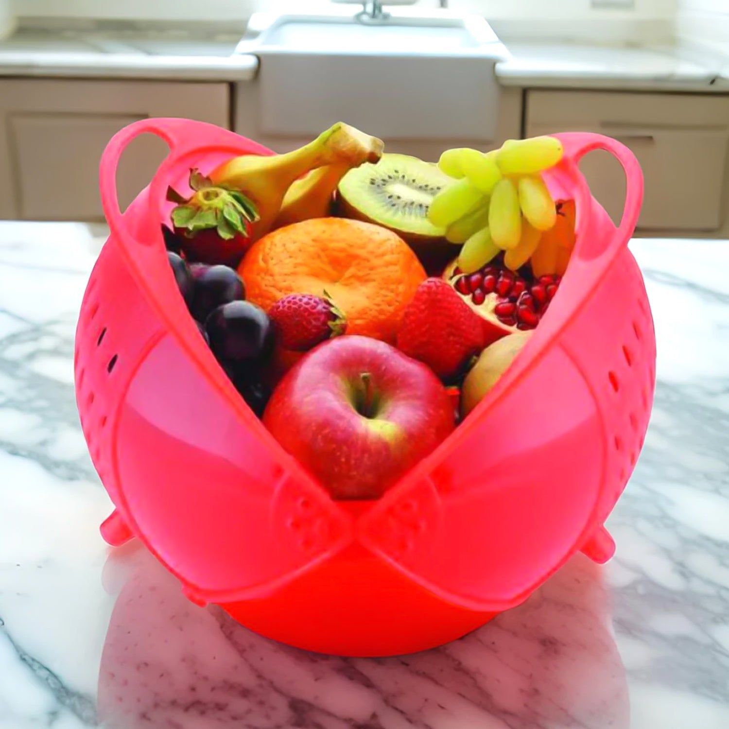 Side view of the versatile fruit and vegetable washing bowl in action.