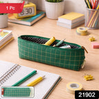 Open green grid pencil pouch showing spacious interior for stationery.