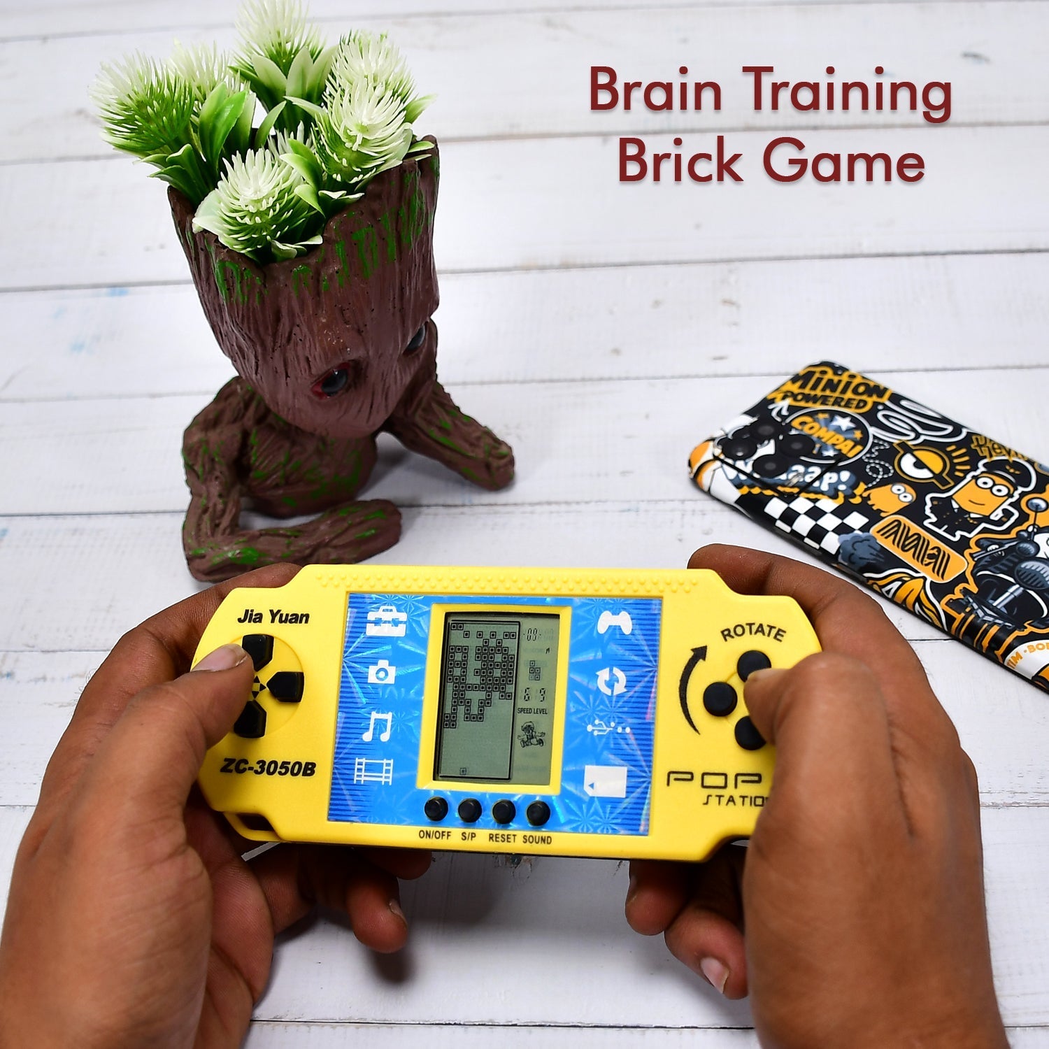 Side profile of the portable pocket game toy, highlighting its slim design.