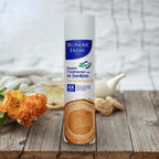 Wonder Fresh Sandalwood Air Freshener bottle shown with natural sandalwood pieces.