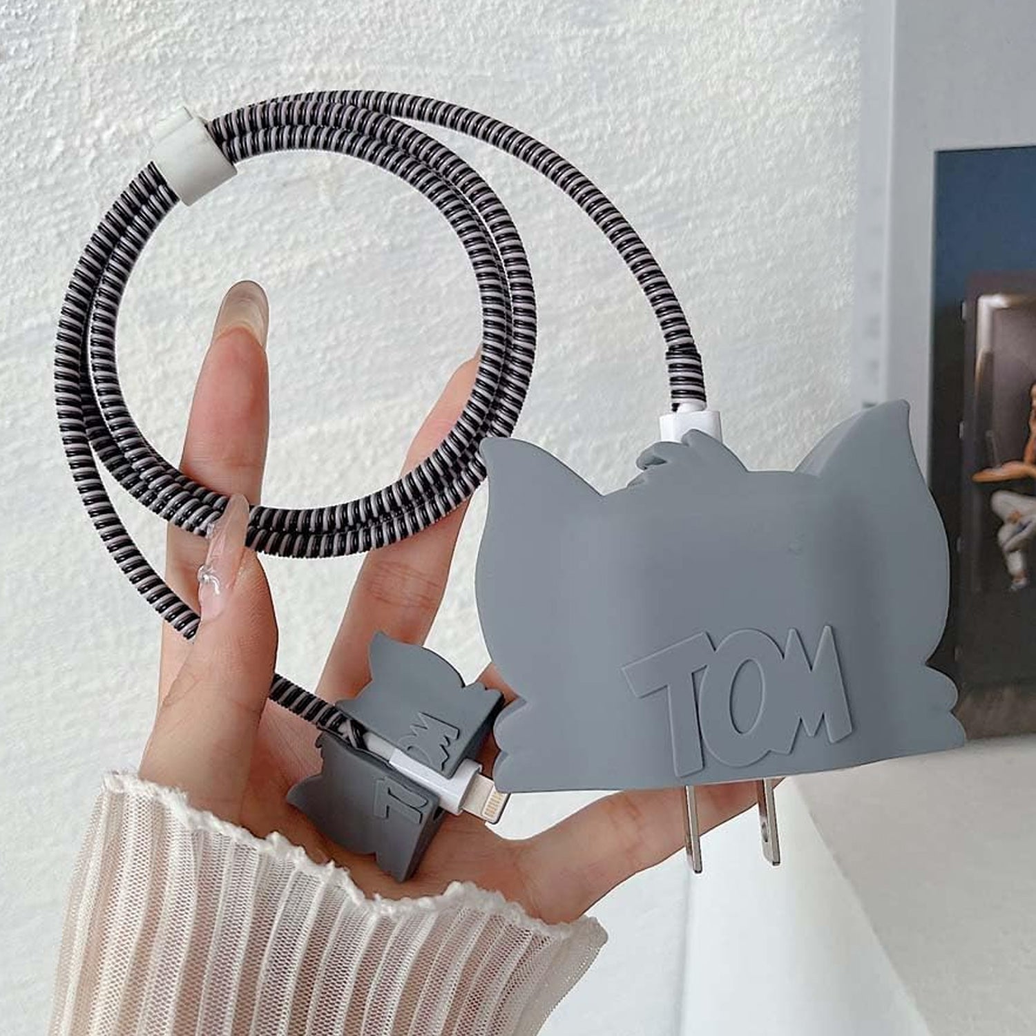 Detailed view of the silicon charger case highlighting its protective features.