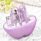 Compact apple-shaped manicure set with 8 stainless steel tools.