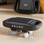 Close-up of the LED display and control buttons on the portable massage gun.