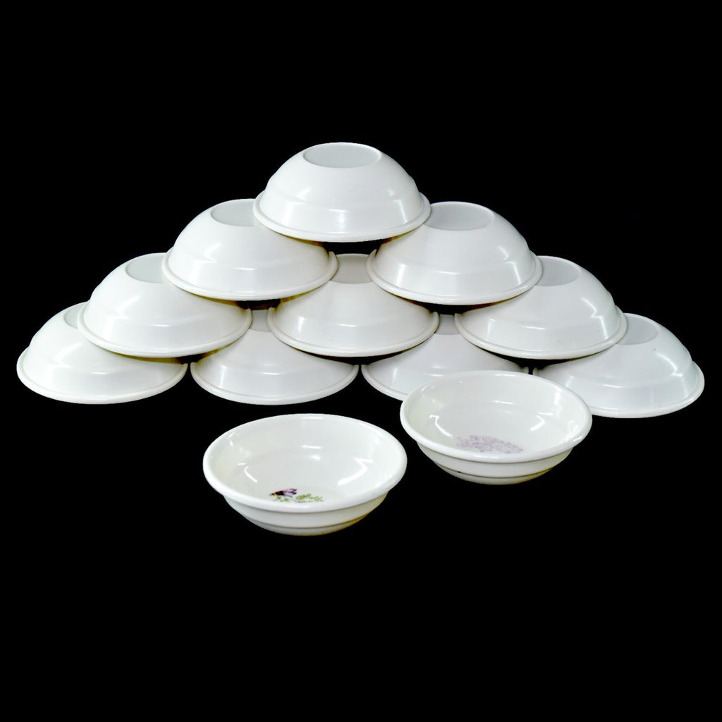 Elegant 32-piece plastic dinner set with plates, bowls, and cutlery.