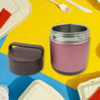 The integrated folding spoon neatly stored within the portable meal container.