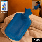 A red hot water bag placed on a bed, offering cozy warmth.