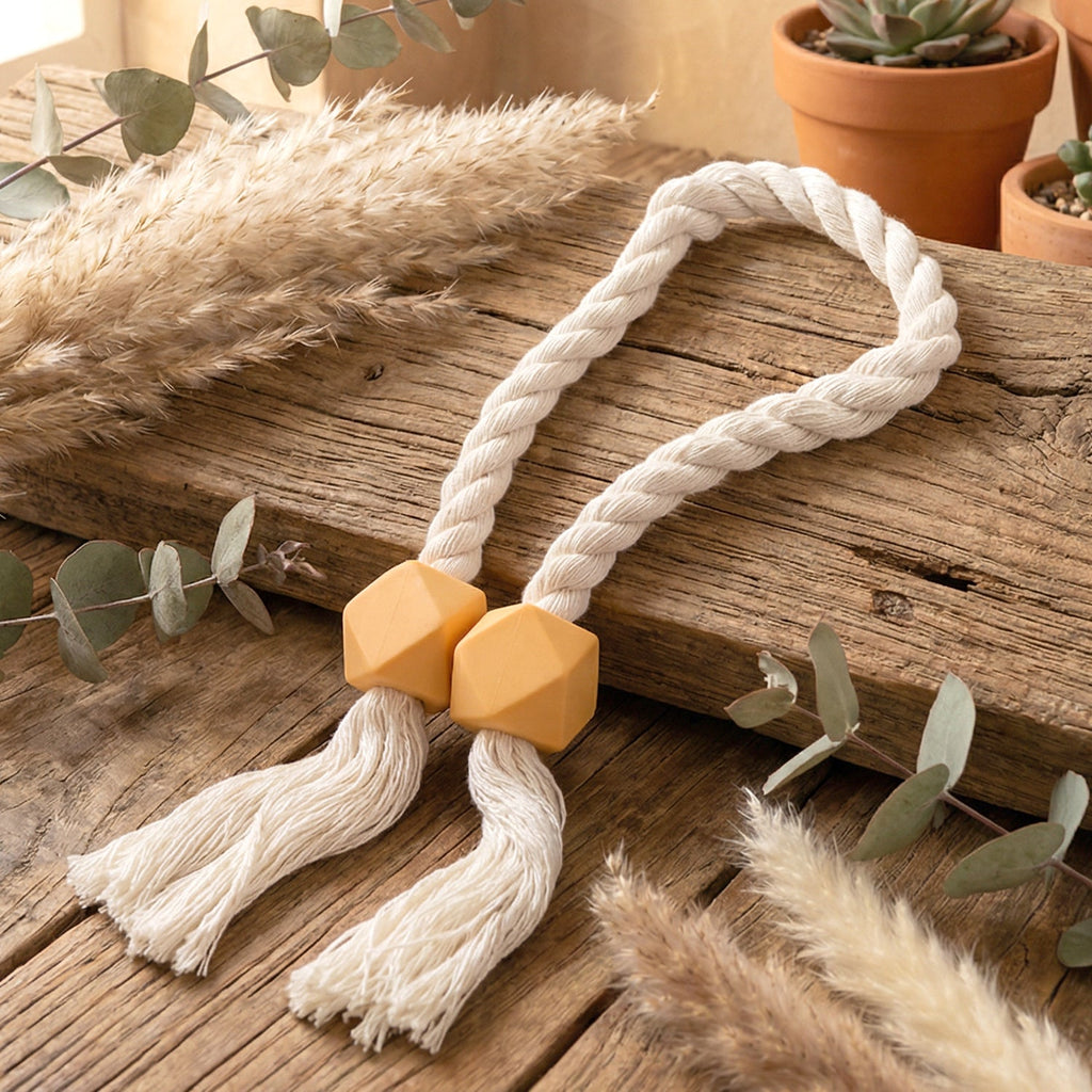 Decorative magnetic curtain tieback with elegant geometric beads.