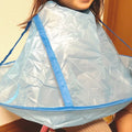 Reusable hair cutting cape with hair-catch guard for mess-free haircuts