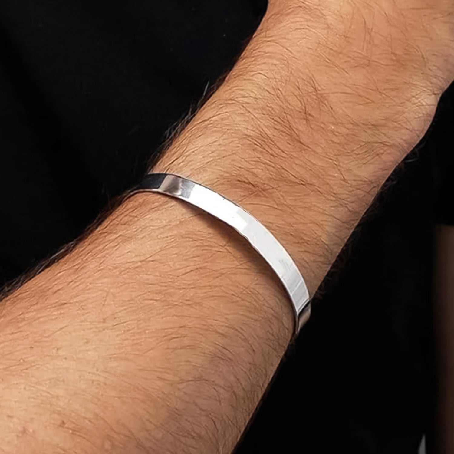 Modern silver stainless steel cuff bracelet with polished surface