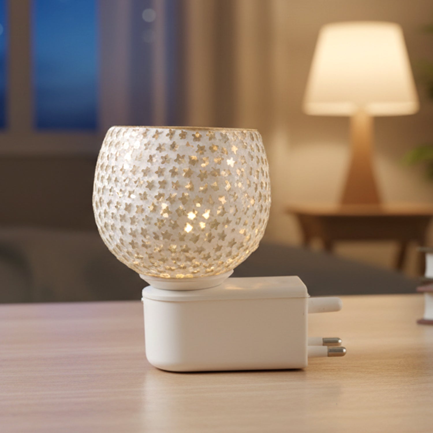 Detailed view of star cut glass design on aroma diffuser lamp