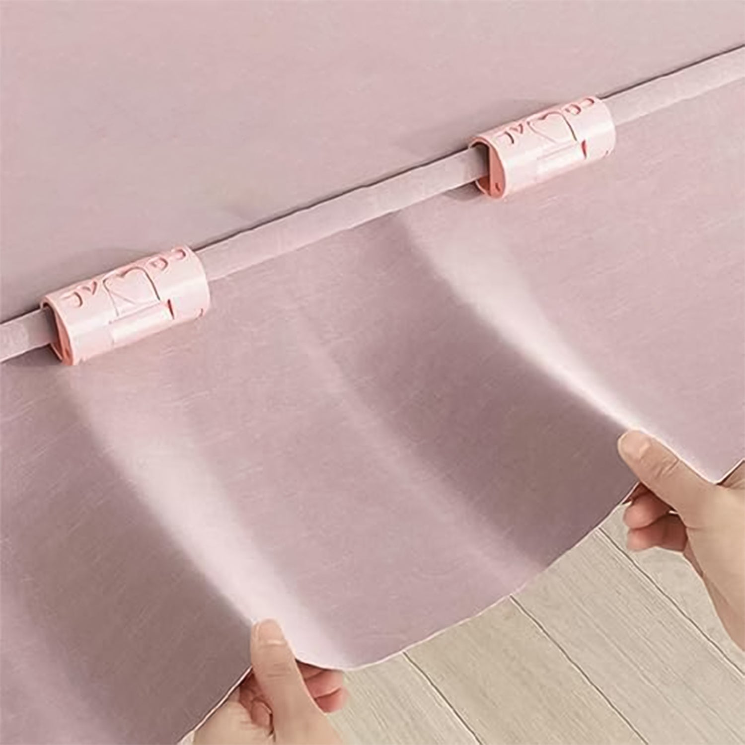Bed sheet clip keeping bedding securely in place and wrinkle-free