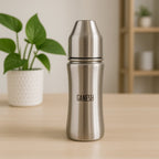 Ganesh 250ml stainless steel baby bottle with anti-colic nipple, ideal for infants.