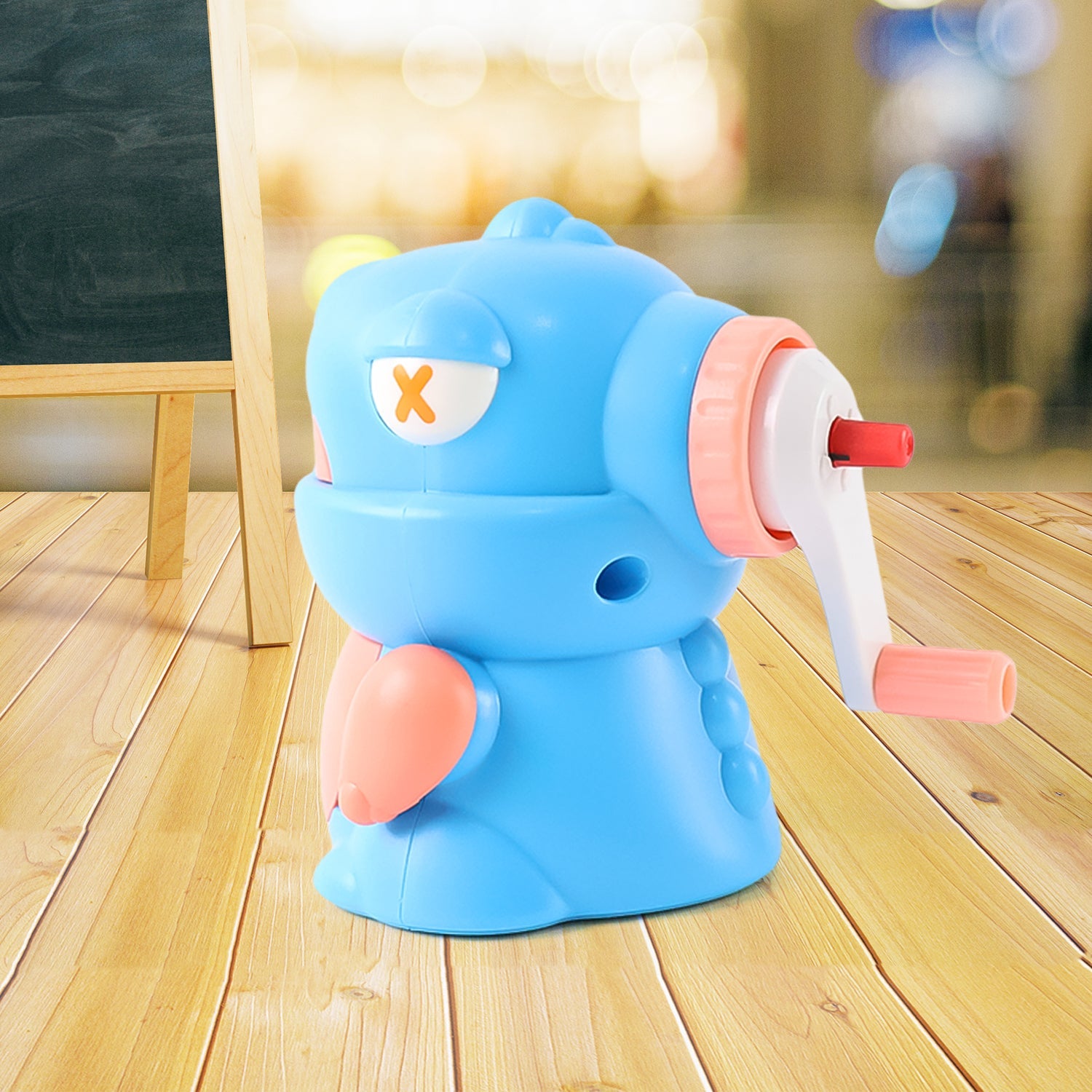 Side view of the teddy pencil sharpener showing the easy-to-remove shavings tray.