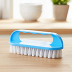 Top view of handheld cleaning brush showing durable build and sturdy bristles.