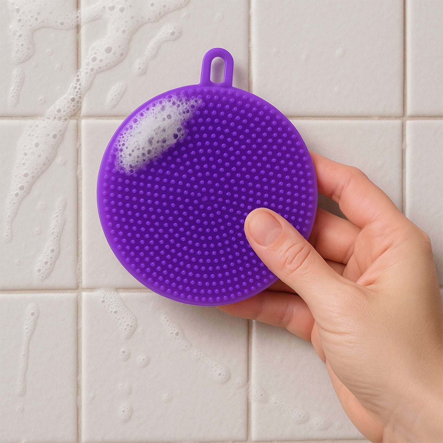 Purple silicone scrubber designed for gentle washing