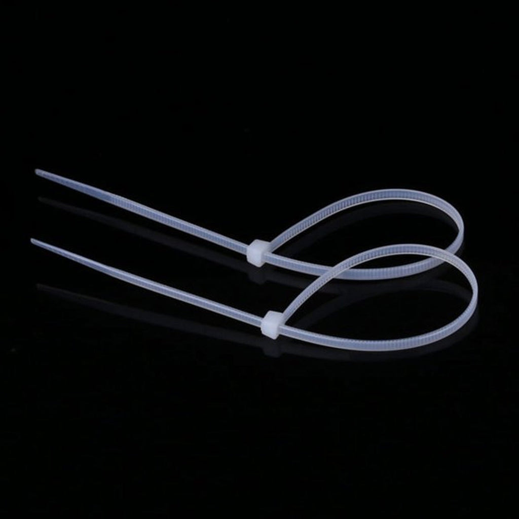 Packaging for a 100-pack of Tidy Table's 3x100mm nylon self-locking cable ties.