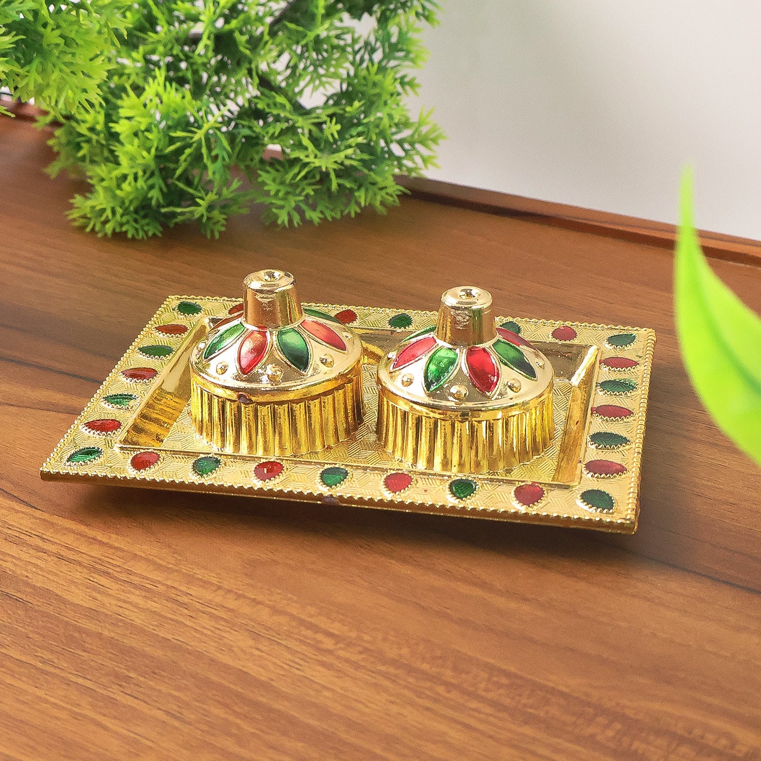 Close-up of the durable plastic pooja thali showcasing its traditional design.