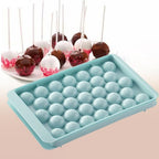 Stackable blue ice ball mold with a clear lid, preventing freezer odors and saving space.