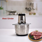 Close-up of the four-blade stainless steel chopping system inside the electric meat grinder.