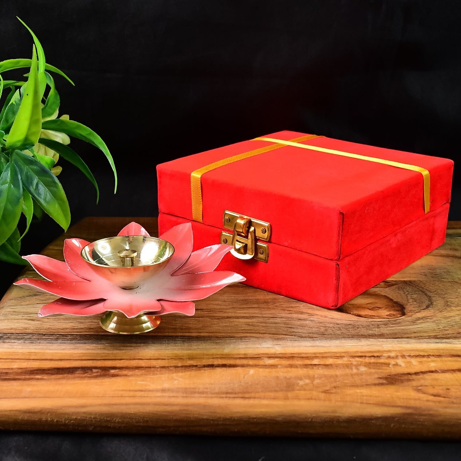 Premium lotus shaped brass oil diya featured with flame lit