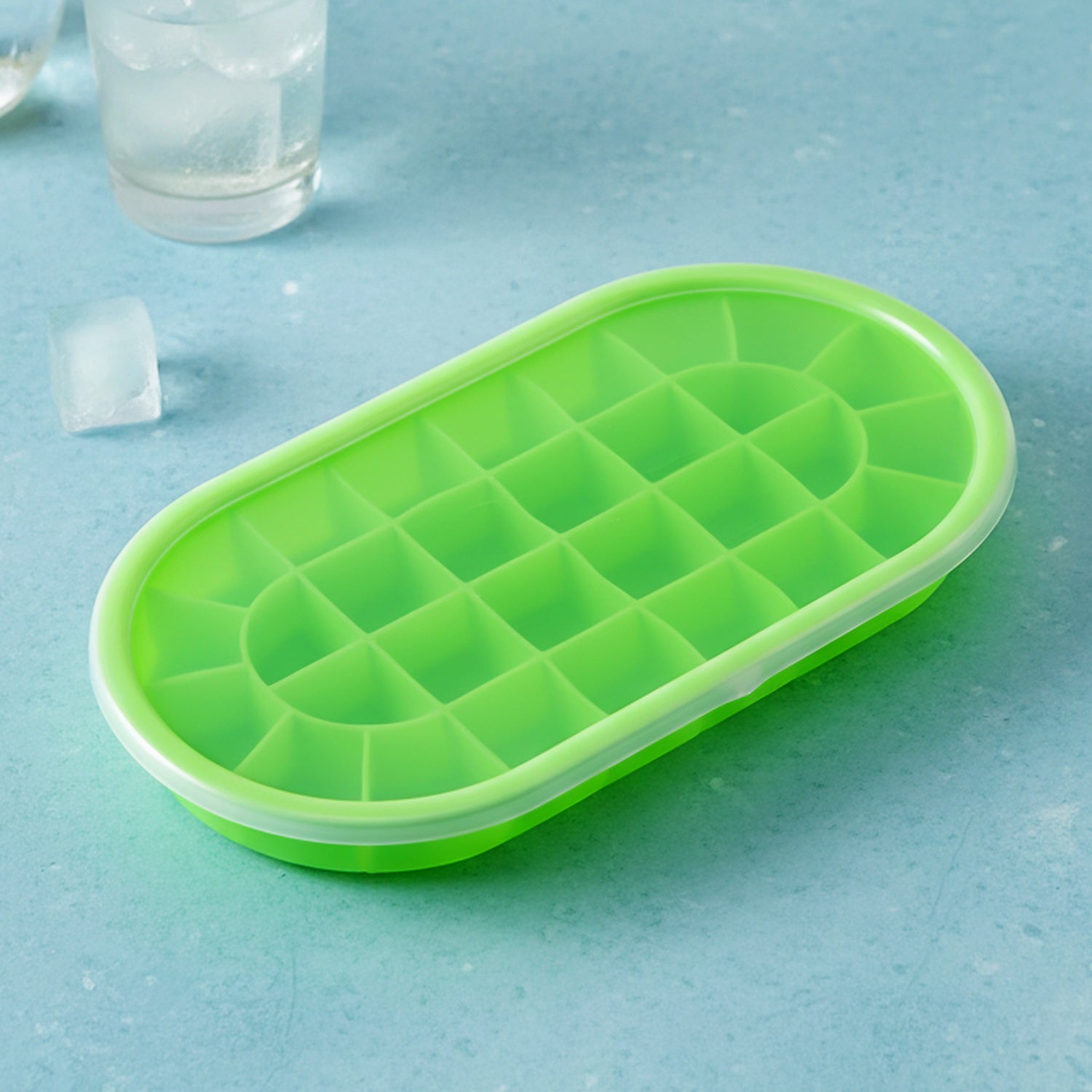 Oval ice cube mold tray designed for beverages and desserts