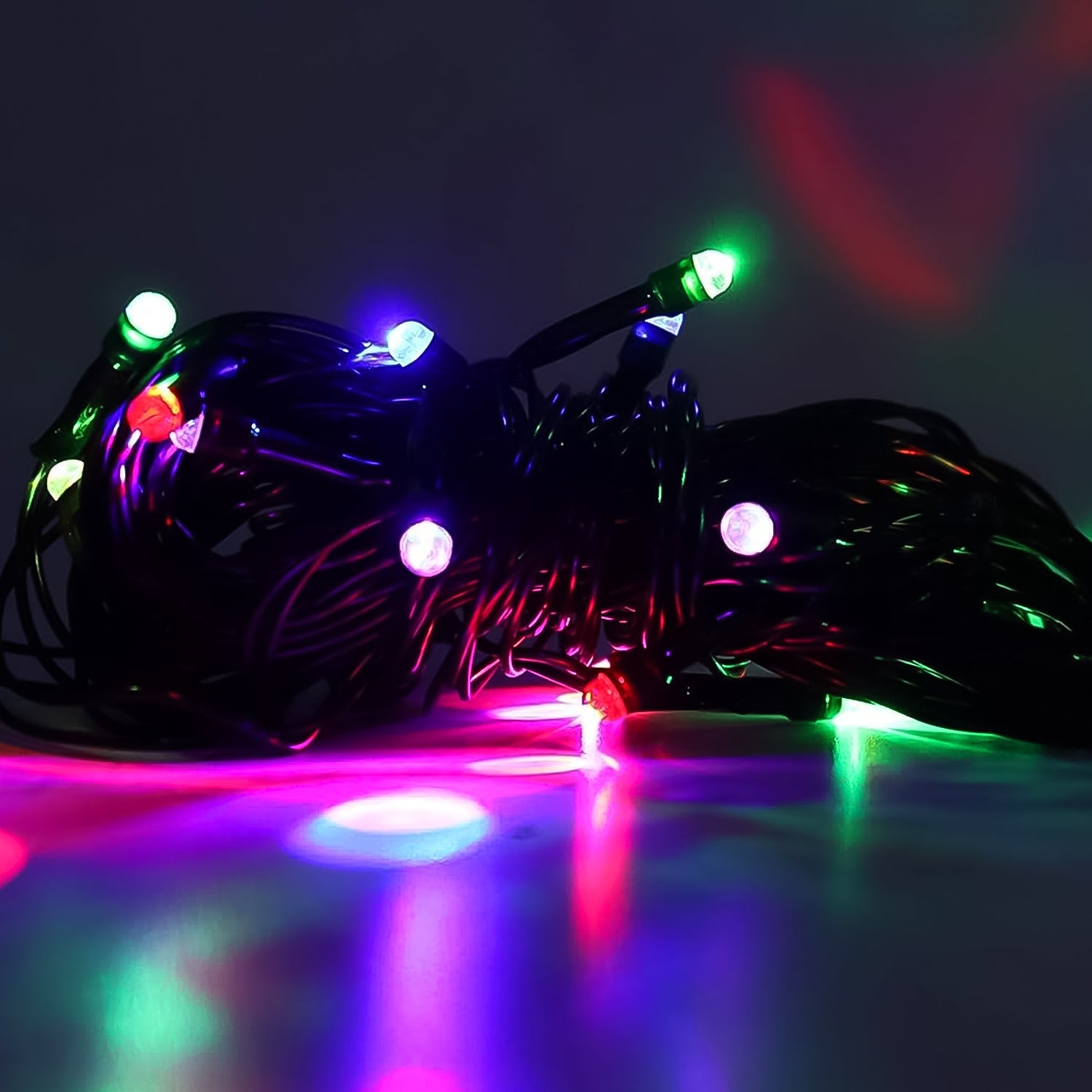 Vibrant LED string lights adding a festive glow to a Diwali celebration display.