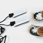 Portable electric shoe dryer with USB and timing feature for drying shoes easily.