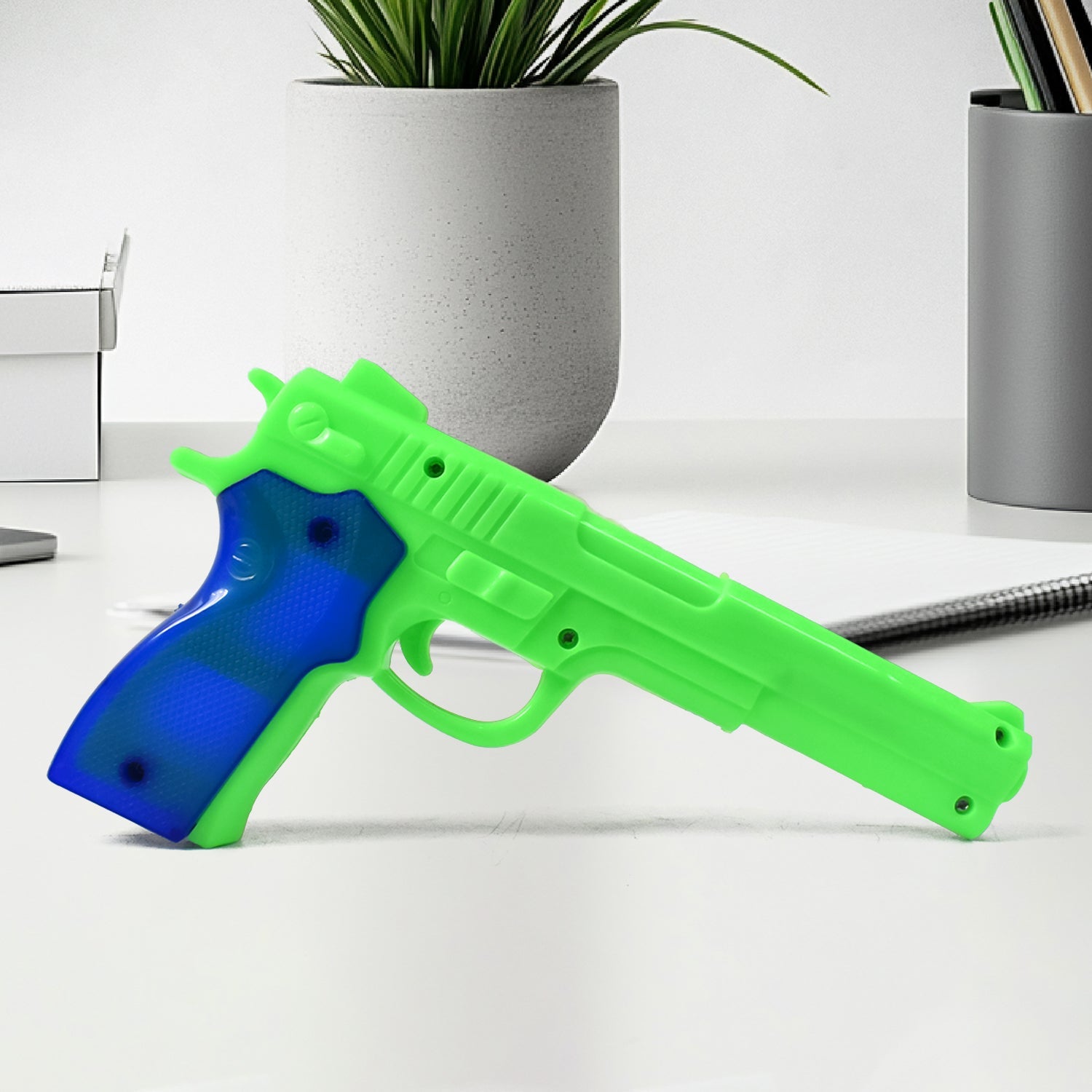 Side view of the Aditi toy gun, ready for play.