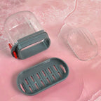 Grey plastic soap box holder designed for bathroom or kitchen use