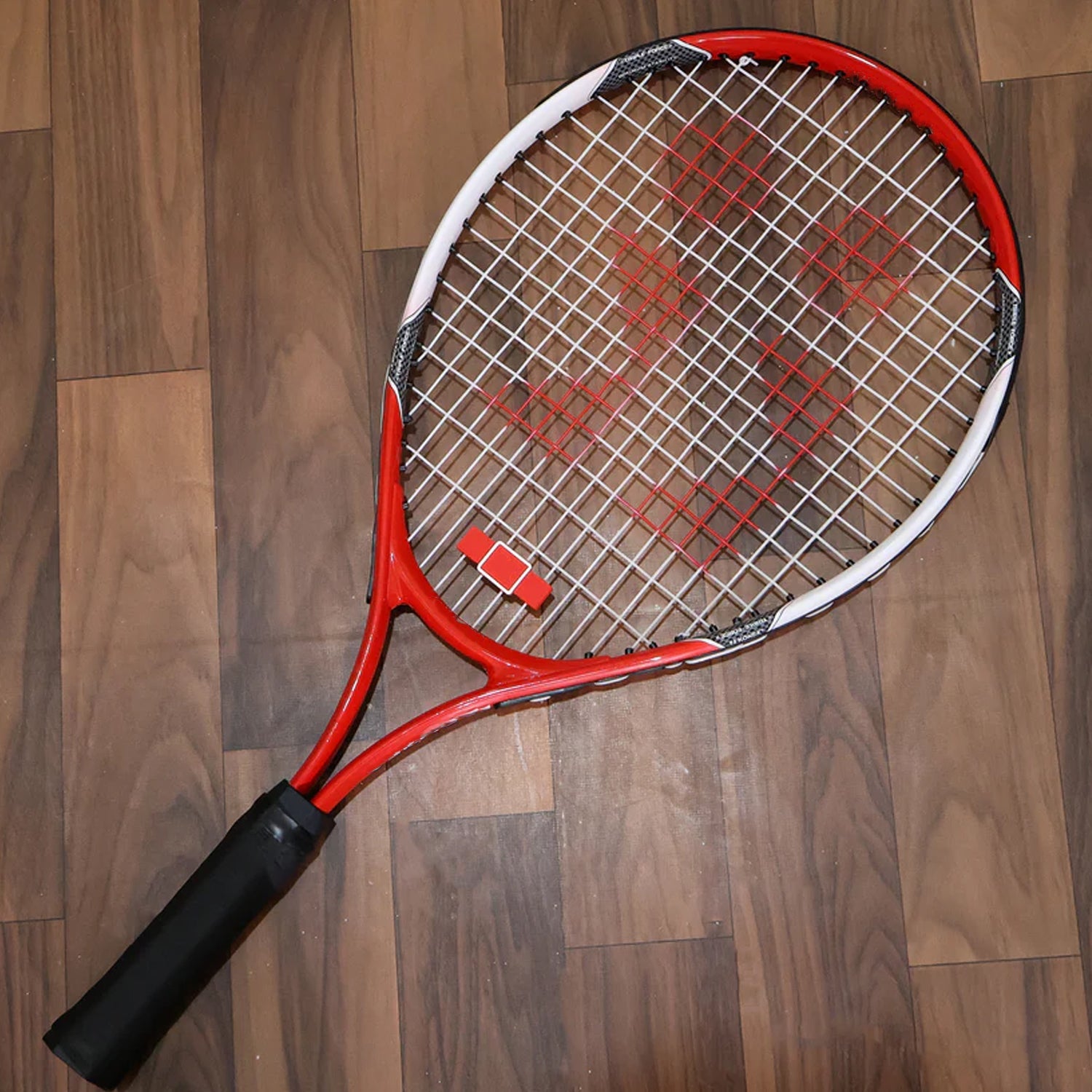 Close-up of tennis racket’s comfortable non-slip grip for reduced fatigue
