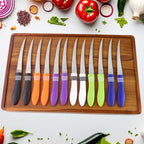 Ergonomic non-slip colorful handle of a serrated kitchen knife from the set.